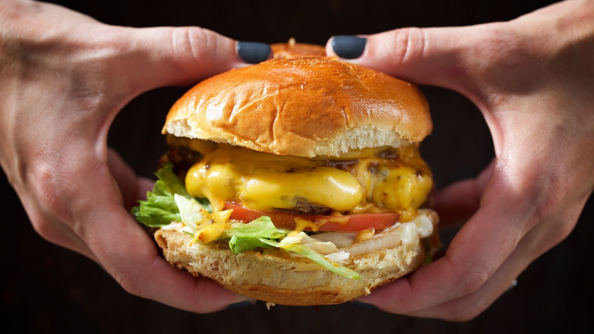 New England Smash Burger with two Ground Chuck Patties, American cheese, Lettuce, Tomato, Pickle, Mayo and Sesame bun at The Salt Line photographed in Washington, DC. (Photo by Deb Lindsey For The Washington Post via Getty Images).