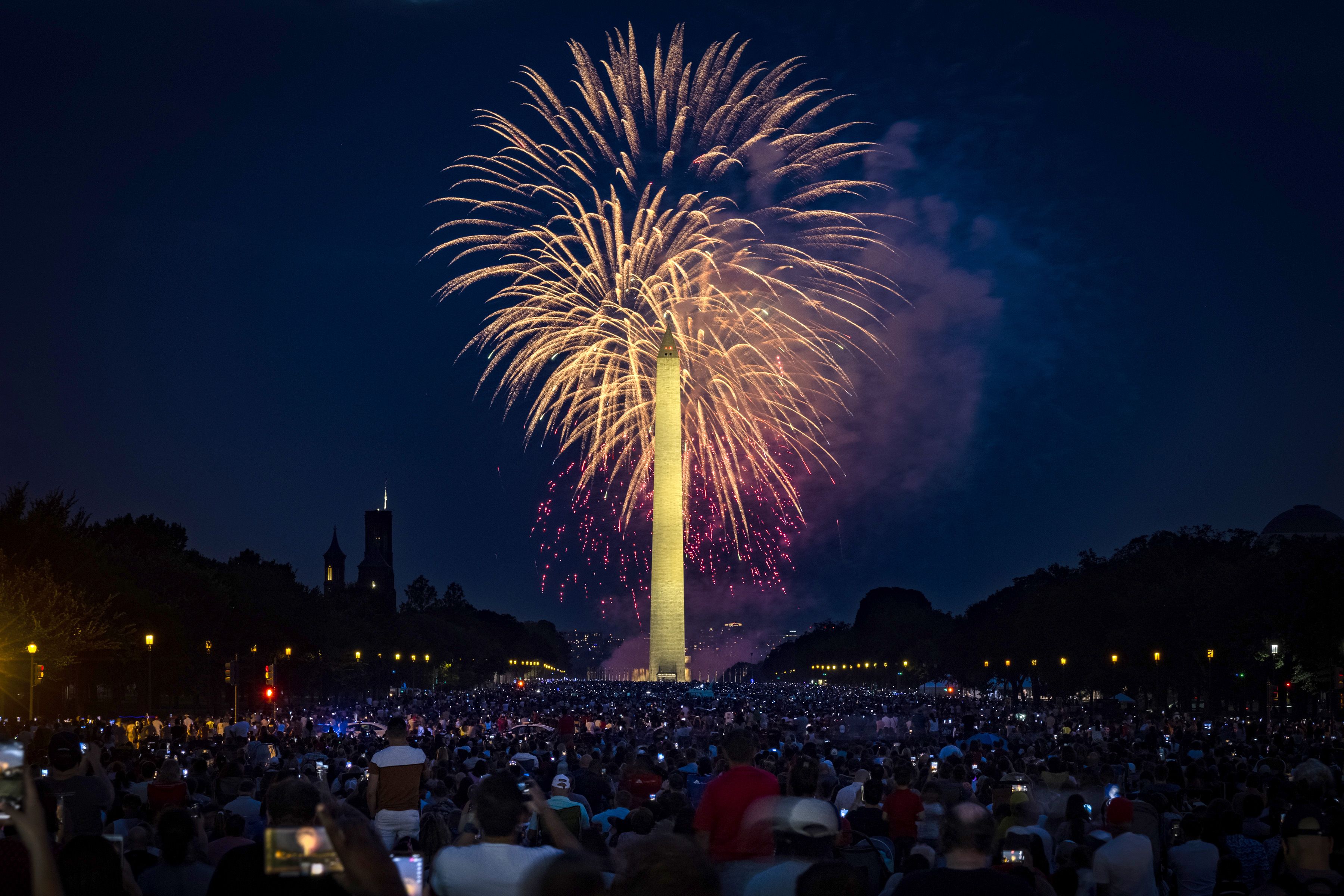 People fill the National Mall to watch the fireworks display during Independence Day celebrations on July 4, 2021 in Washington, DC. 