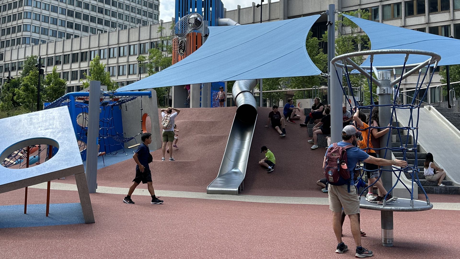 Children playing on the playground at Charles River Plaza.
