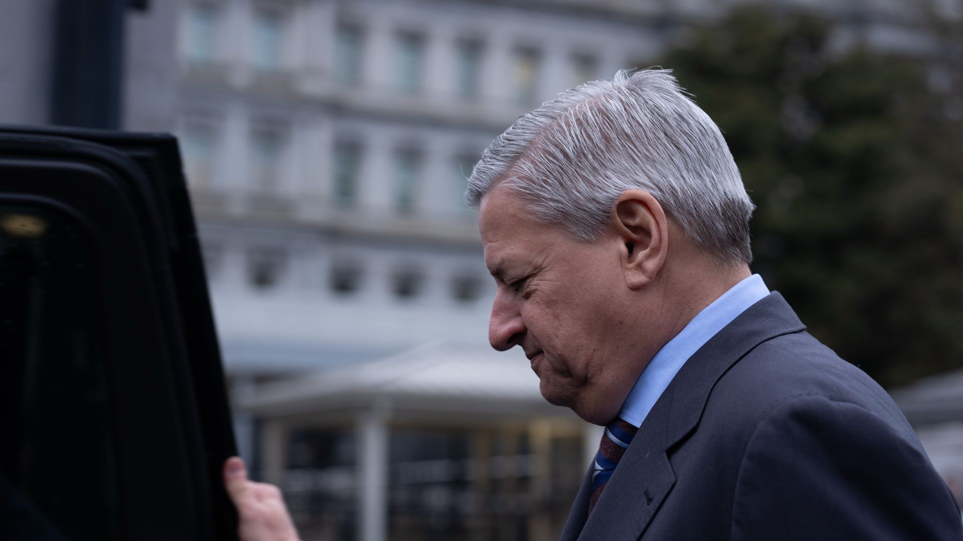 Alt text: Netflix co-CEO Ted Sarandos walks outside the White House in Washington, D.C., on Feb. 26, 2026.