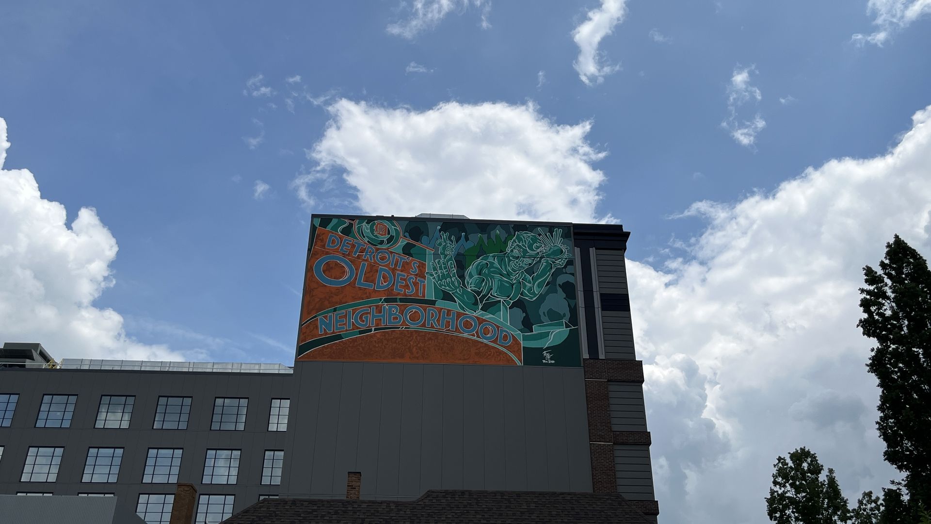 View from distance of a mural at the Godfrey Hotel