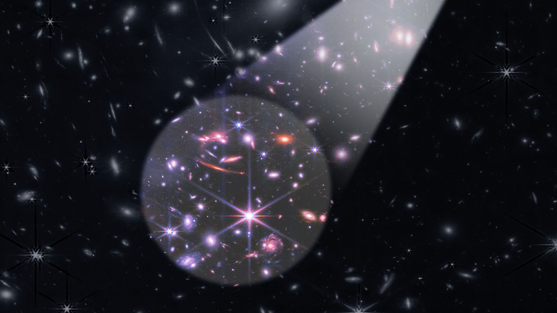 Photo illustration of a black and whtie galaxy with a spotlight revealing a brightly colored area. 