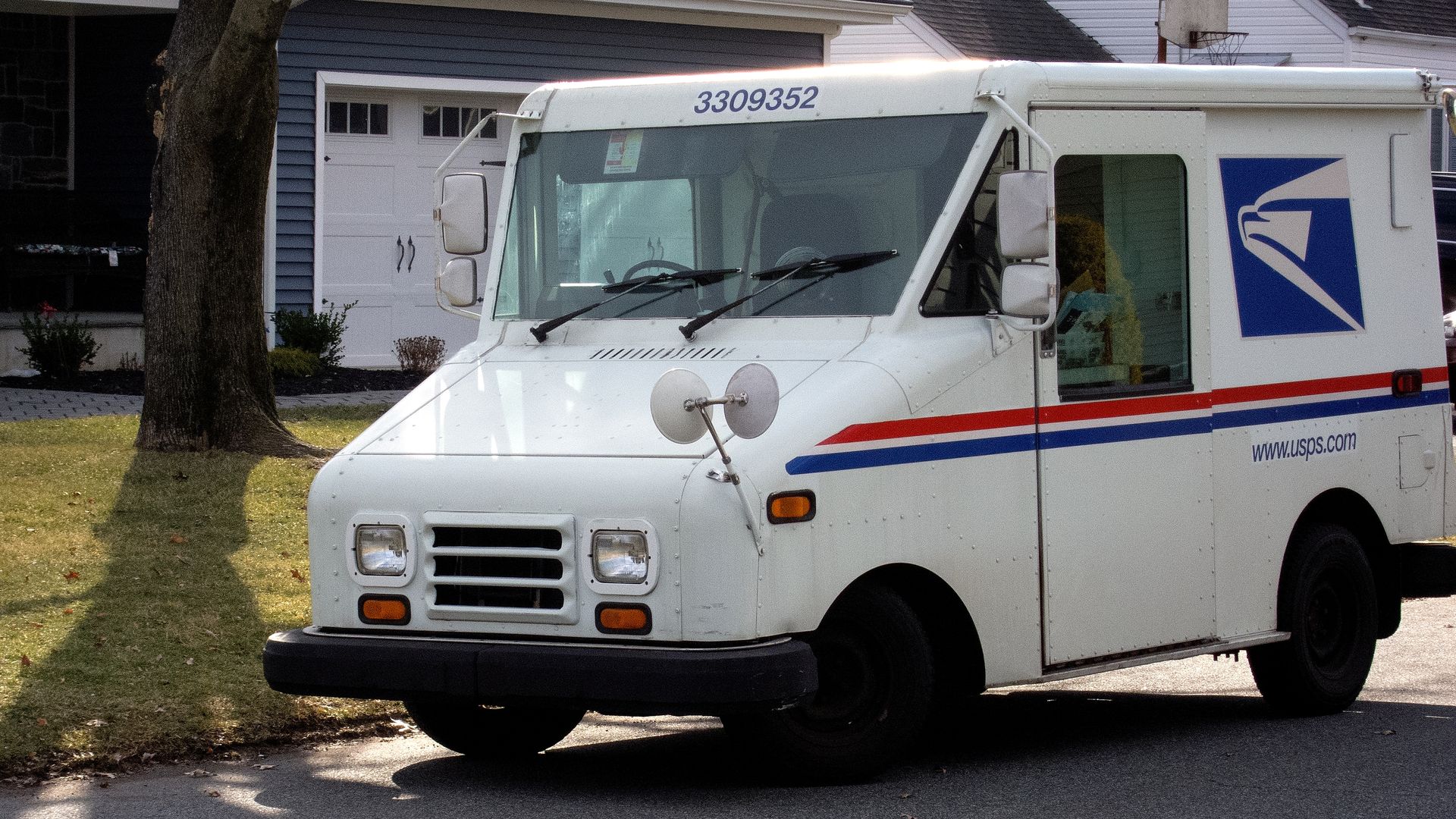 A mail truck parked on a street