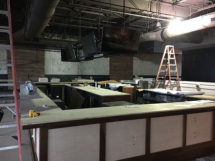 inside burtons grill under construction