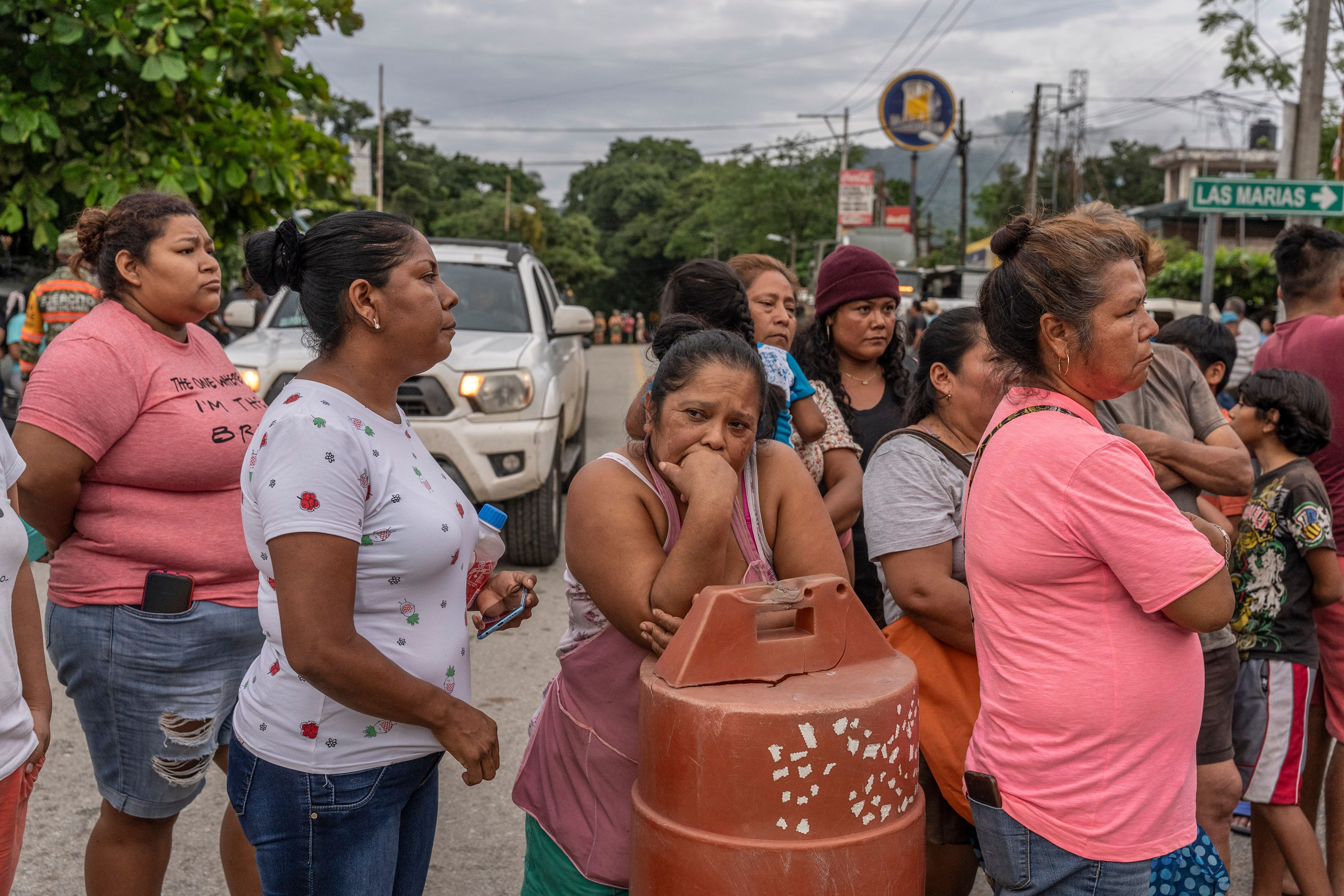 Residents of the Mexican city of Xaltianguis waiting for aid on Oct. 26.