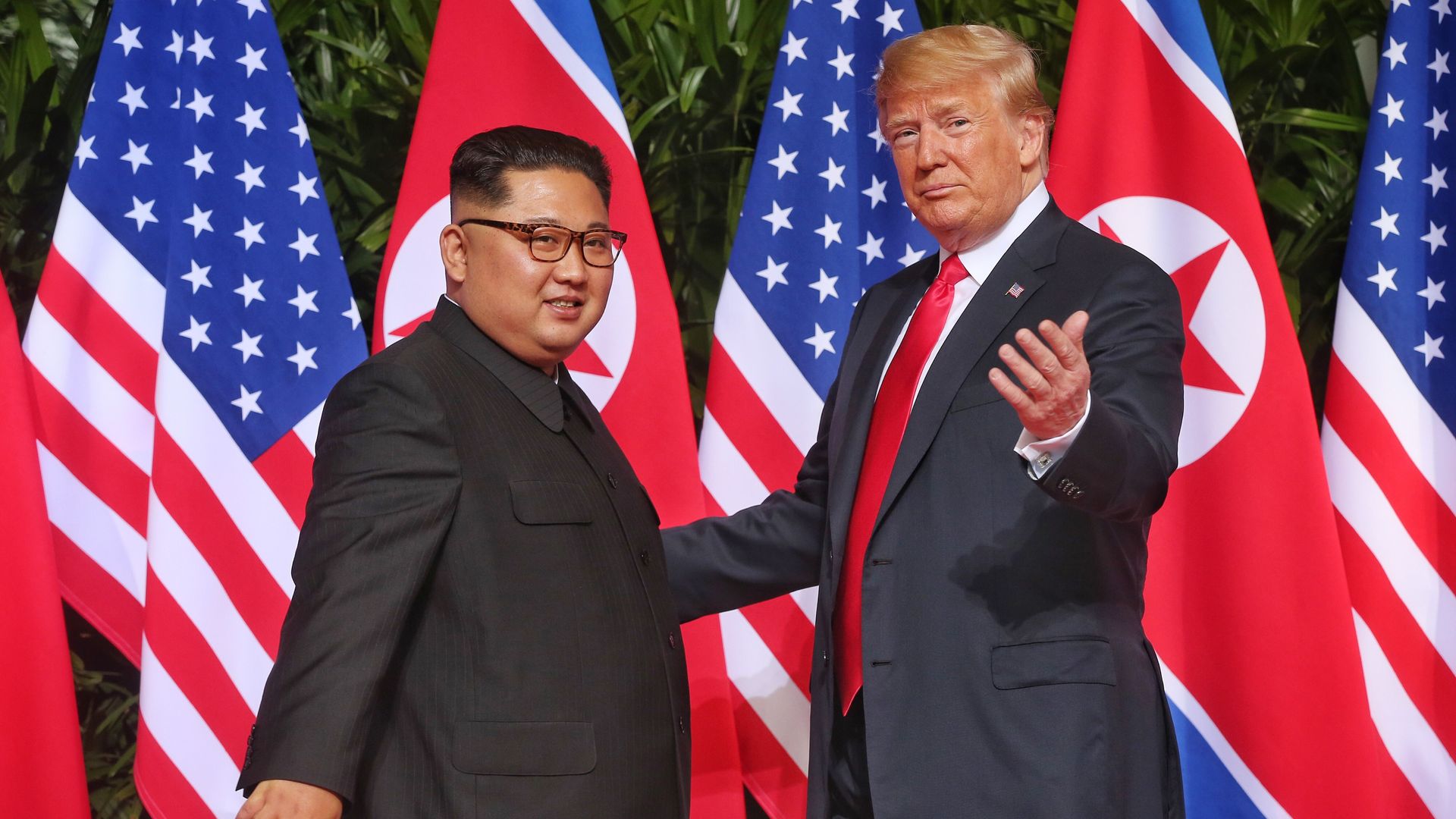 Trump greets Kim Jong-un in Singapore