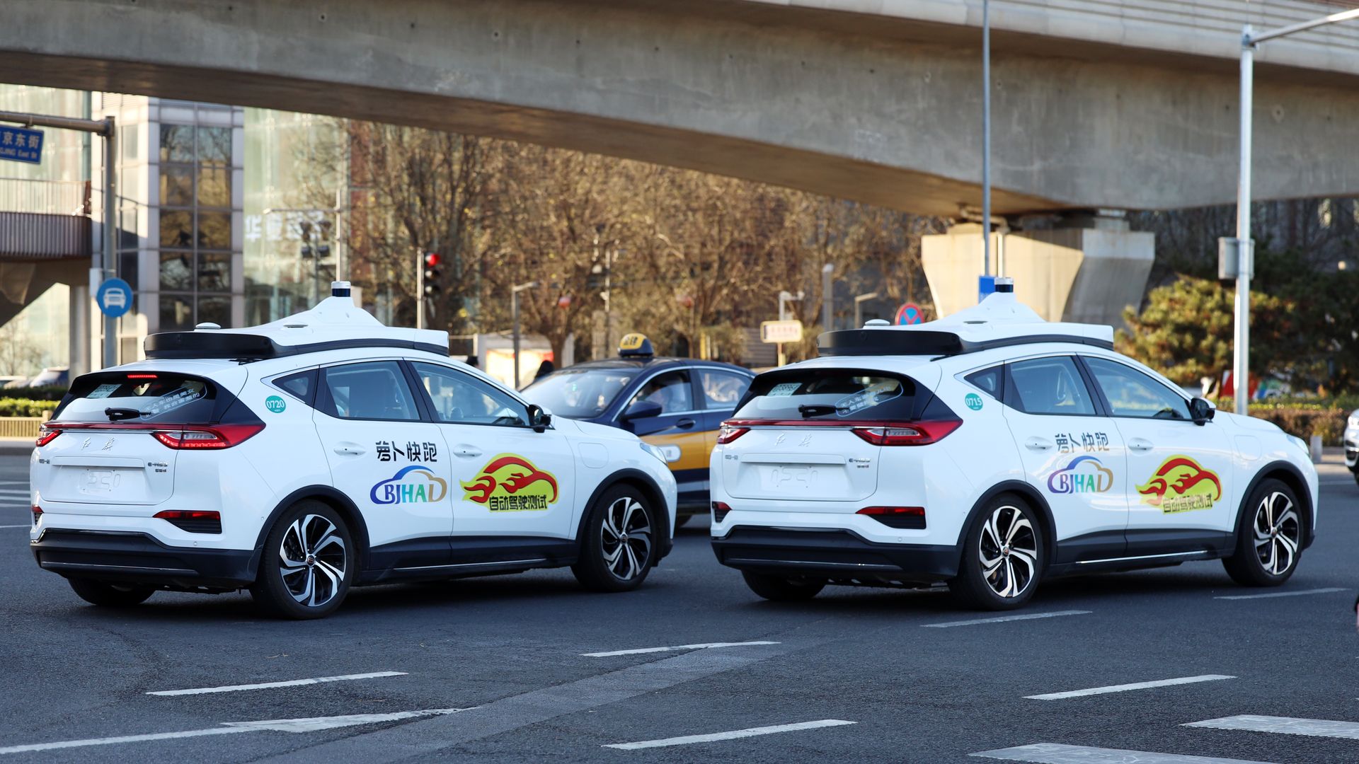 two driverless cars from Baidu shown on roads of Beijing