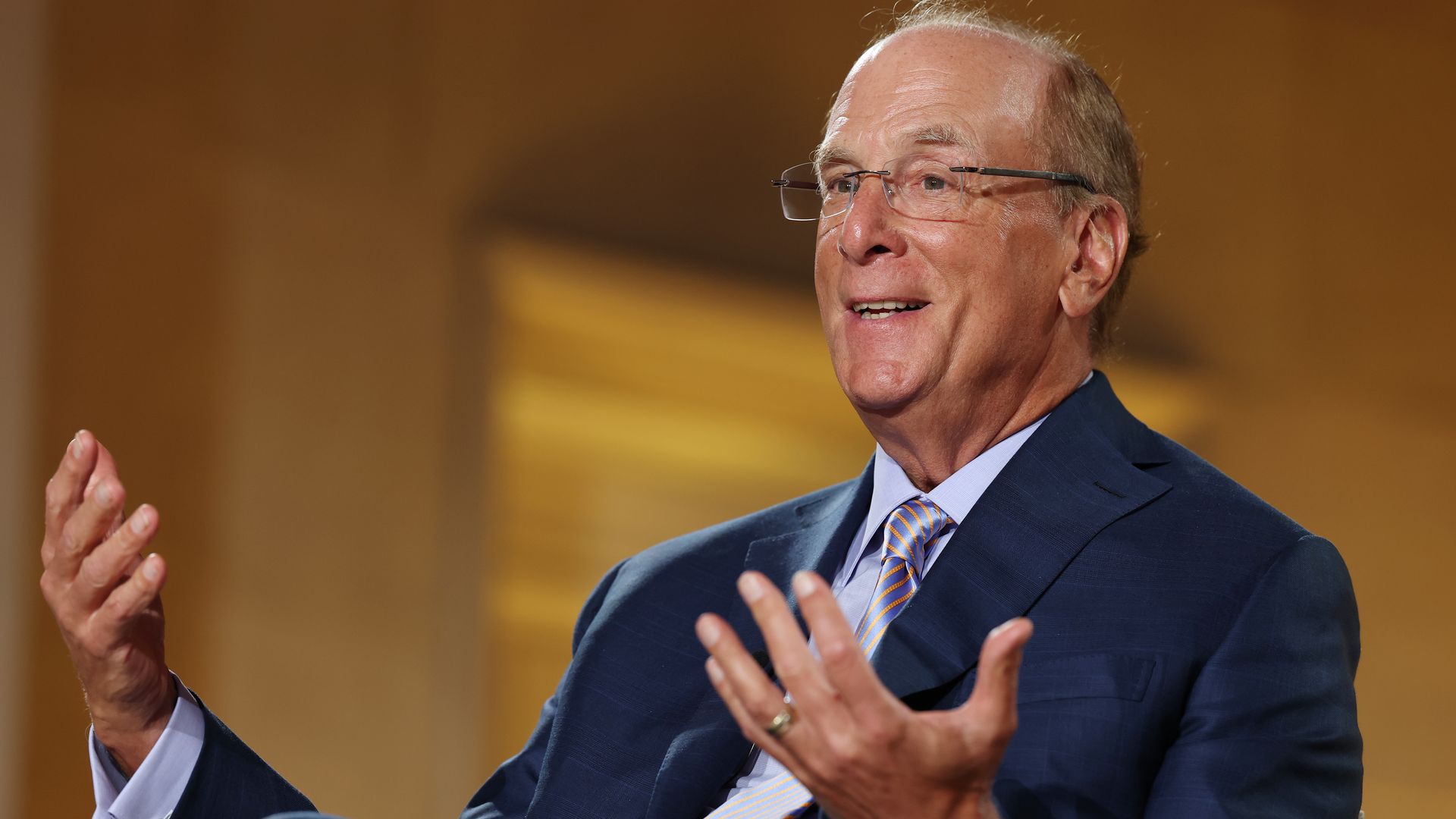 WASHINGTON, DC - MARCH 11: CEO of BlackRock Larry Fink speaks during a panel at the BlackRock Infrastructure Summit on March 11, 2026 in Washington, DC. The global investment management company held the summit consisting of leaders from government, business, and labor to address expanding U.S. infra