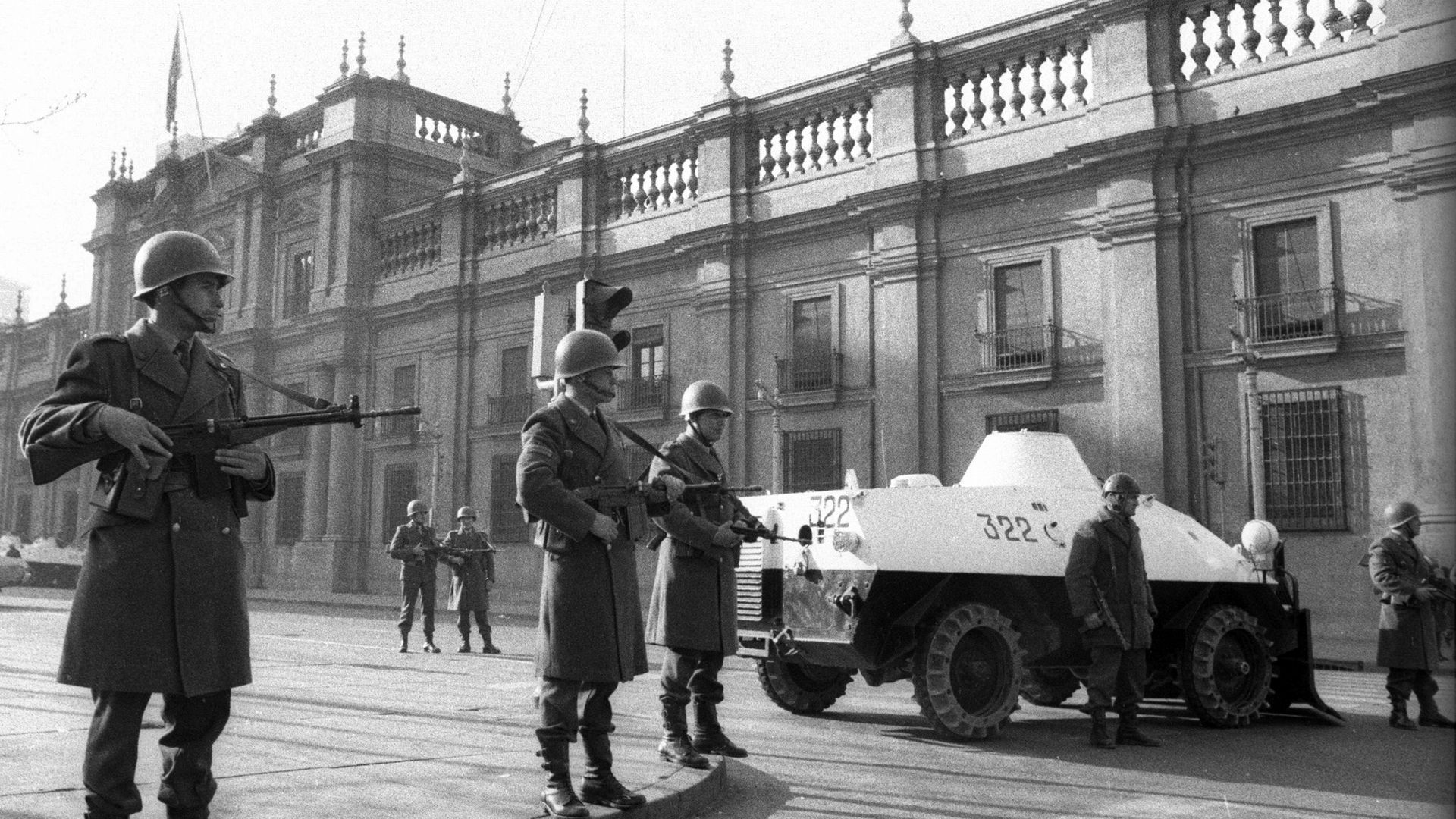 Chilean Carabineros surround La Moneda Presidential Palace at 8 am, September 11th, 1973. Bound by law to be the Presidential Guard, one hour later they betrayed Constitutional President Salvador Allende by switching sides and joining the coup led by General Augusto Pinochet. 