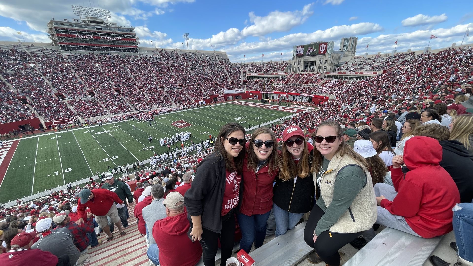 The IU football stadium, with the field showing and stands filled with fans.