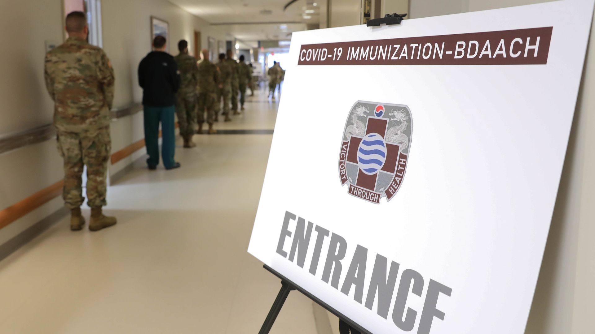 U.S. soldiers stand in line to receive the first COVID-19 vaccines at Brian D. Allgood Army Community Hospital at U.S. Army Garrison Humphreys on December 29, 2020 in Pyeongtaek, South Korea.