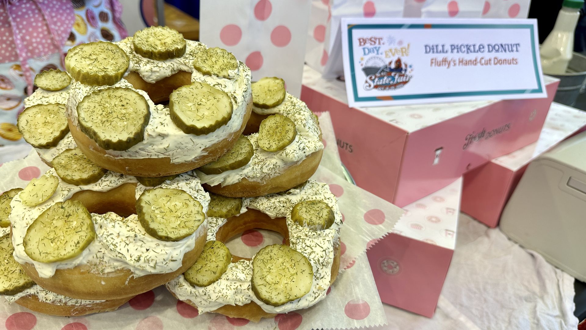Dill pickle doughnuts sit on display.
