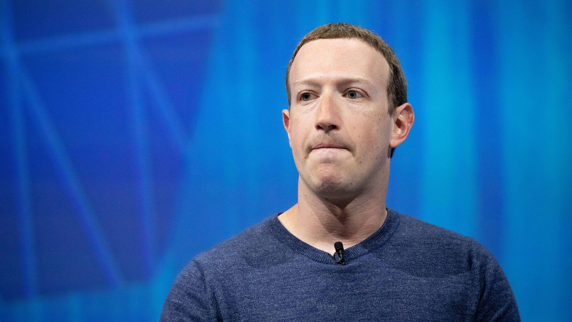Mark Zuckerberg bites his lip.