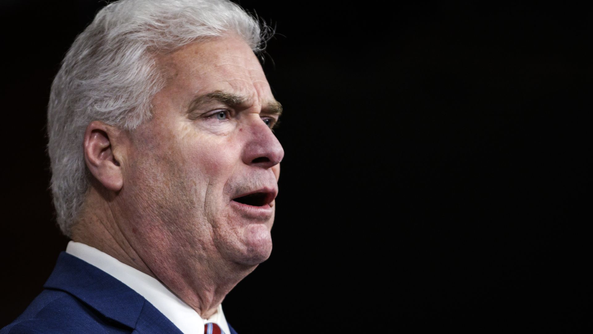 A profile photo of older man speaking. 