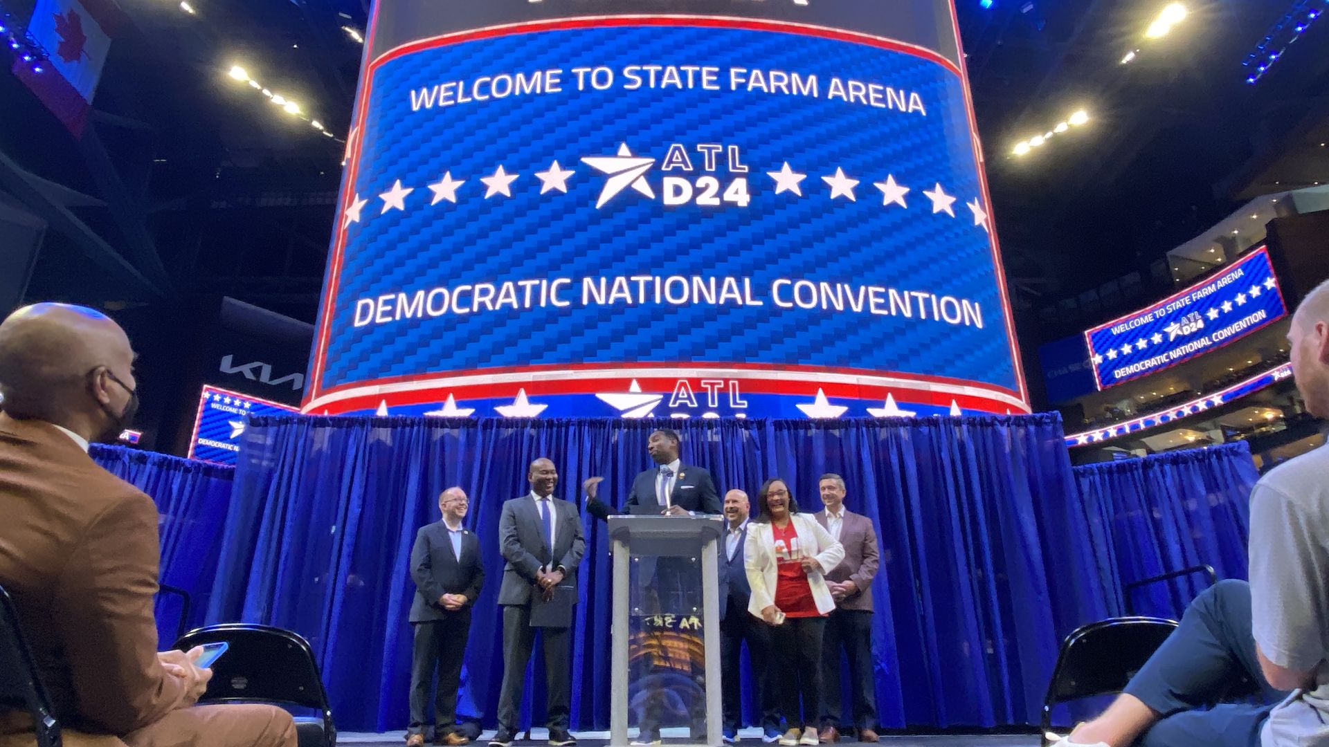 Andre Dickens, Congressmember Nikema Williams and DNC officials stand in front of the Jumbotron hyping Atlanta as the city to host the party’s 2024 convention 