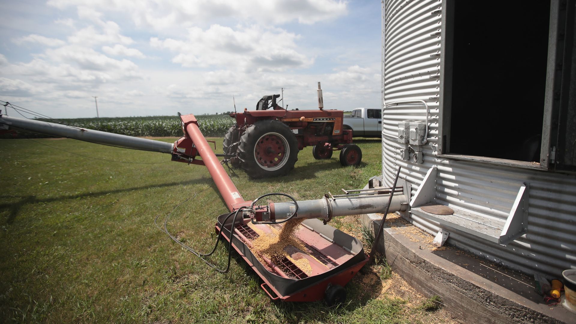In this image, soybeans are being loaded into a grain silo.