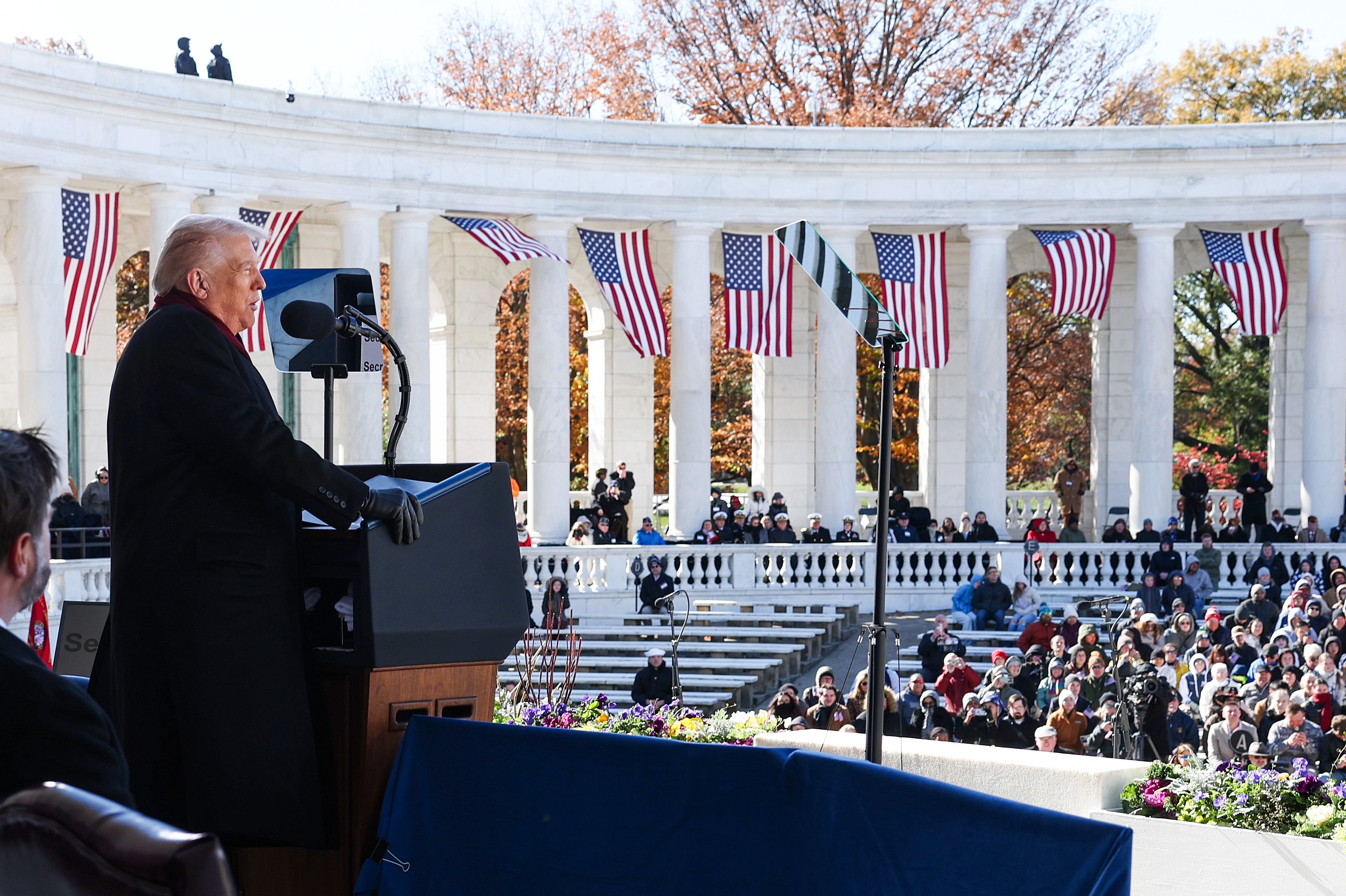 ARLINGTON, VIRGINIA - NOVEMBER 11: U.S. President Donald Trump delivers remarks during a ceremony at Memorial Amphitheater at Arlington National Cemetery to mark Veterans Day on November 11, 2025 in Arlington, Virginia. Members of the Trump administration visited Arlington National Cemetery to obser