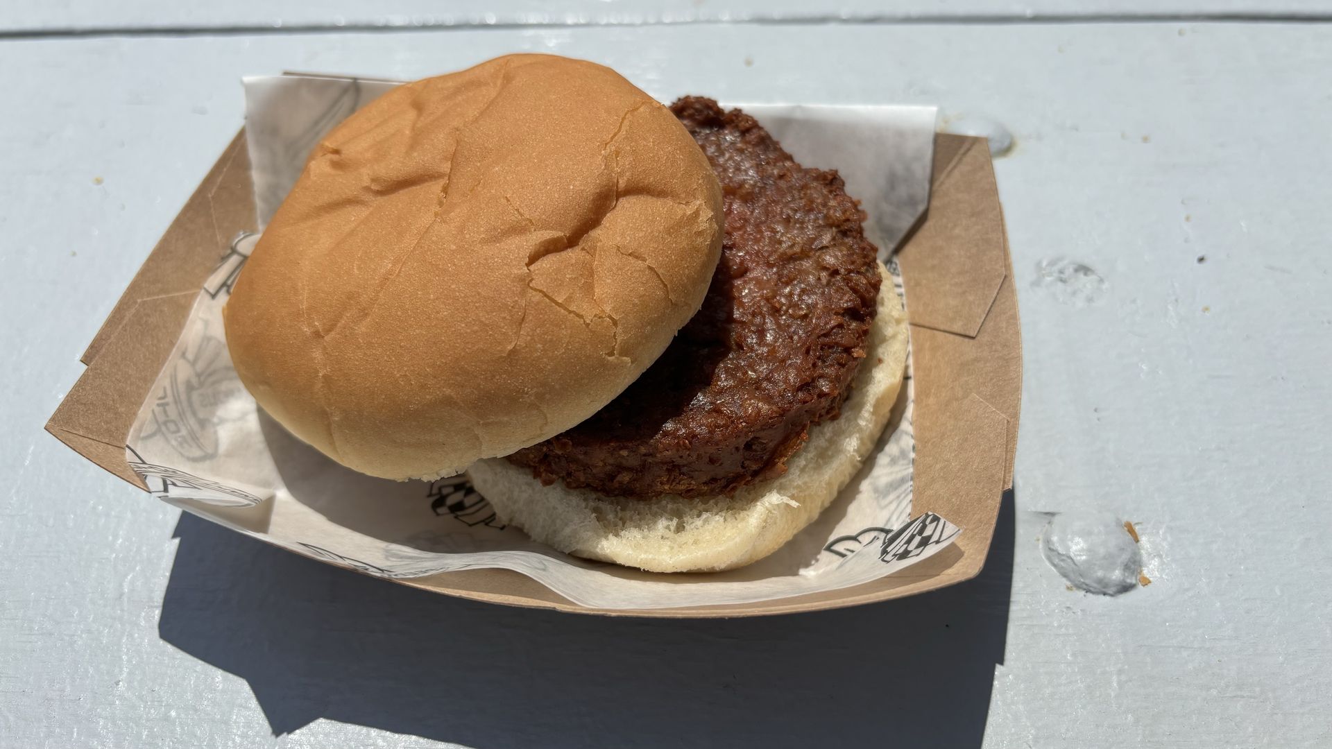 A burger in a paper boat