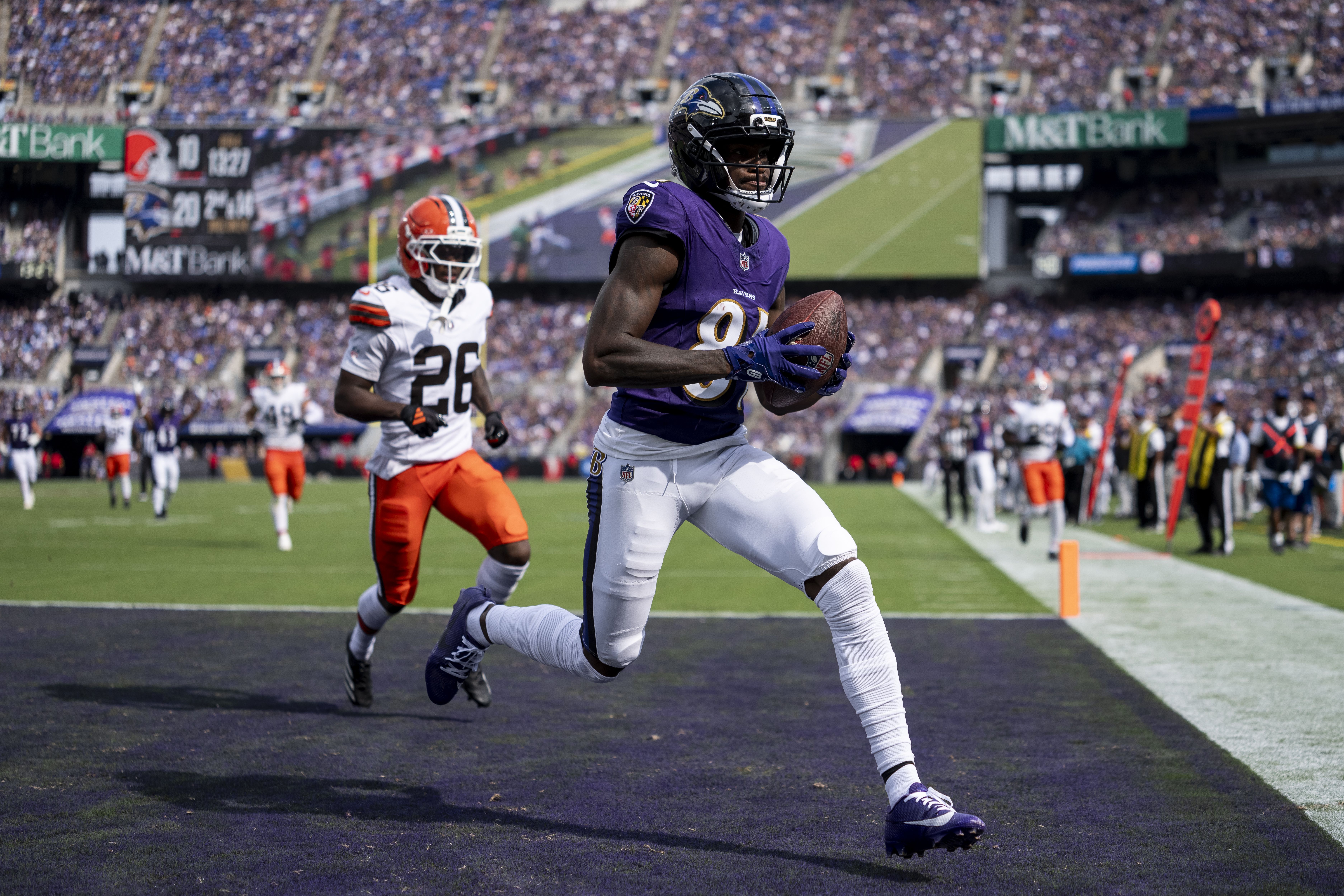 Devontez Walker #81 of the Baltimore Ravens completes a catch for a touchdown during an NFL football game against the Cleveland Browns at M&T Bank Stadium on September 14, 2025 in Baltimore, Maryland.