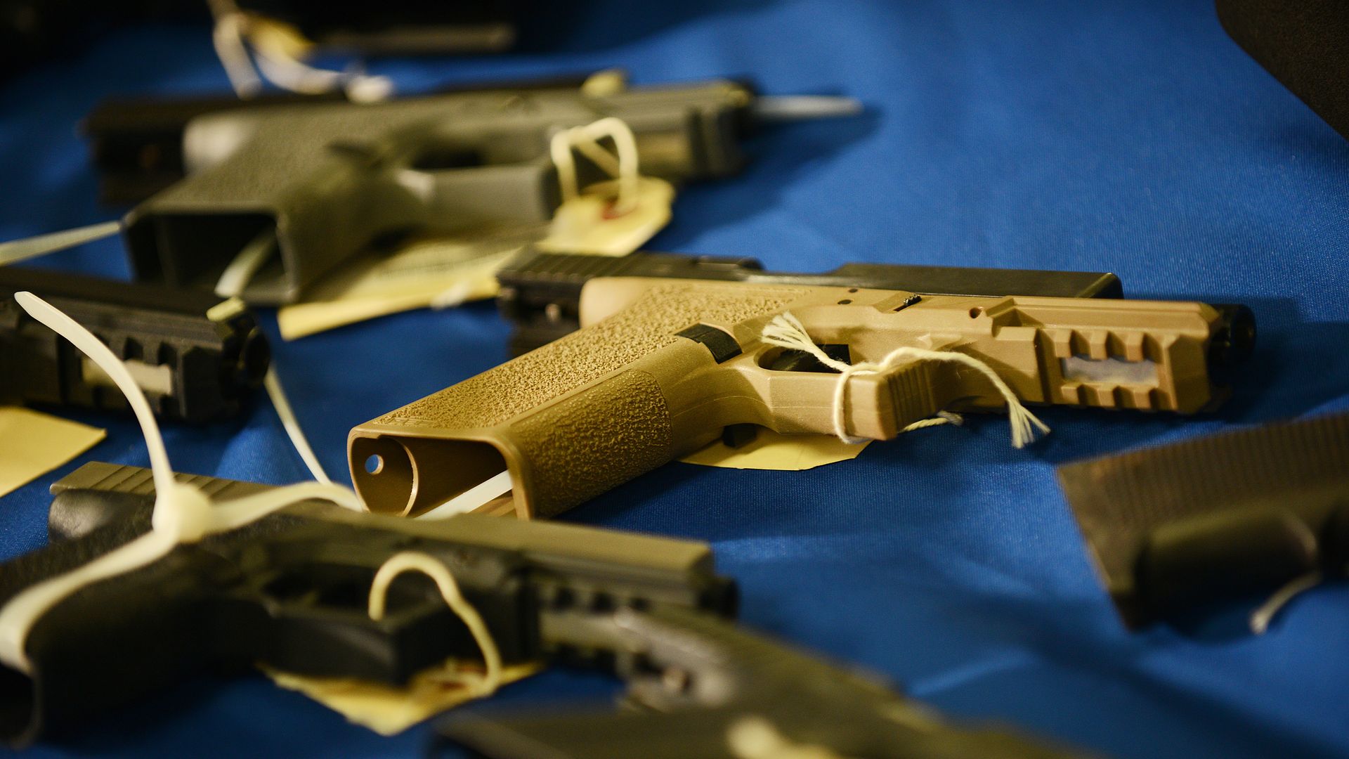 "Ghost guns" that were secured by the DC Metropolitan Police Department are on display during a press conference