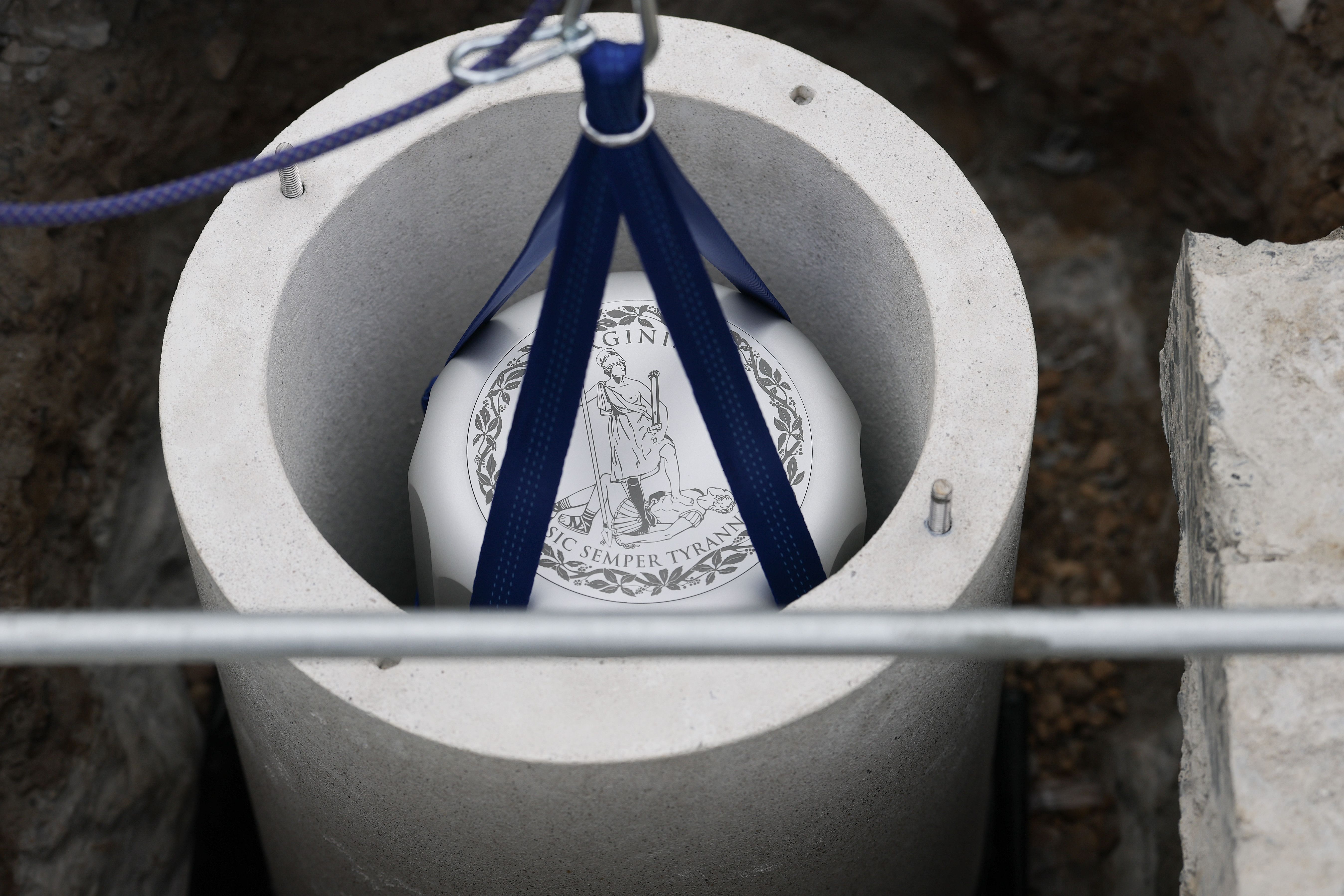 A time capsule being lowered