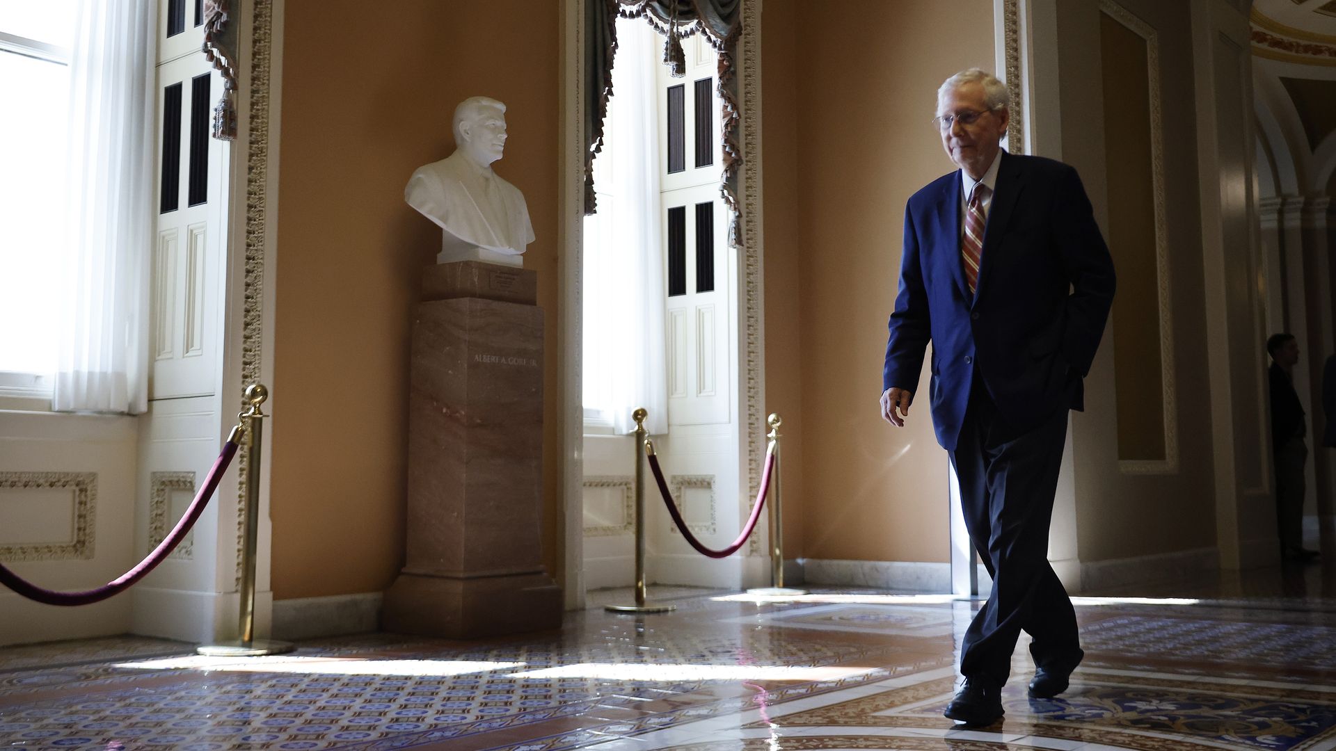 Senate Minority Leader Mitch McConnell (R-KY) returns to his office in the U.S. Capitol after delivering remarks on the Senate floor