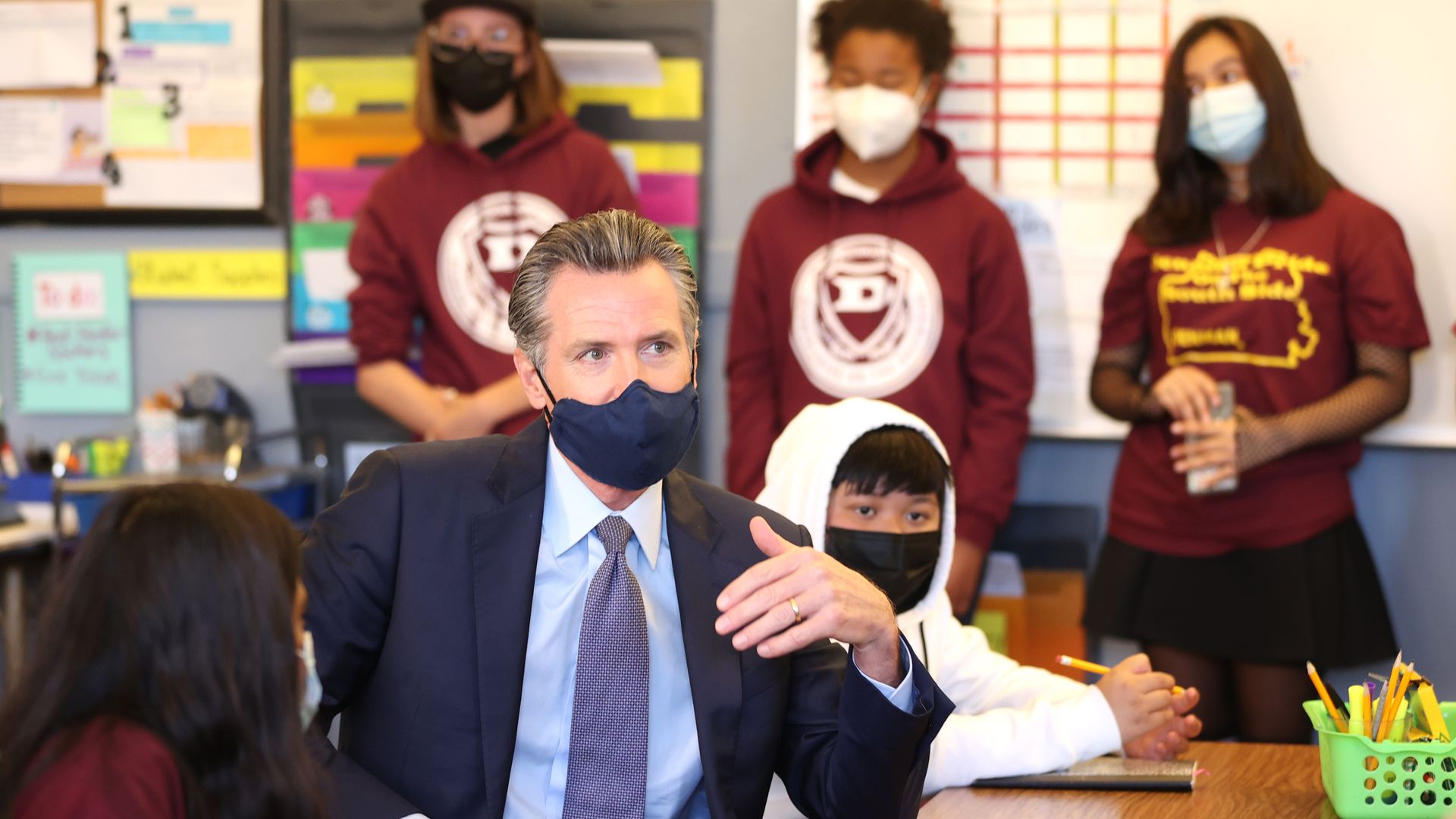 Gov. Newsom in a classroom with students. 