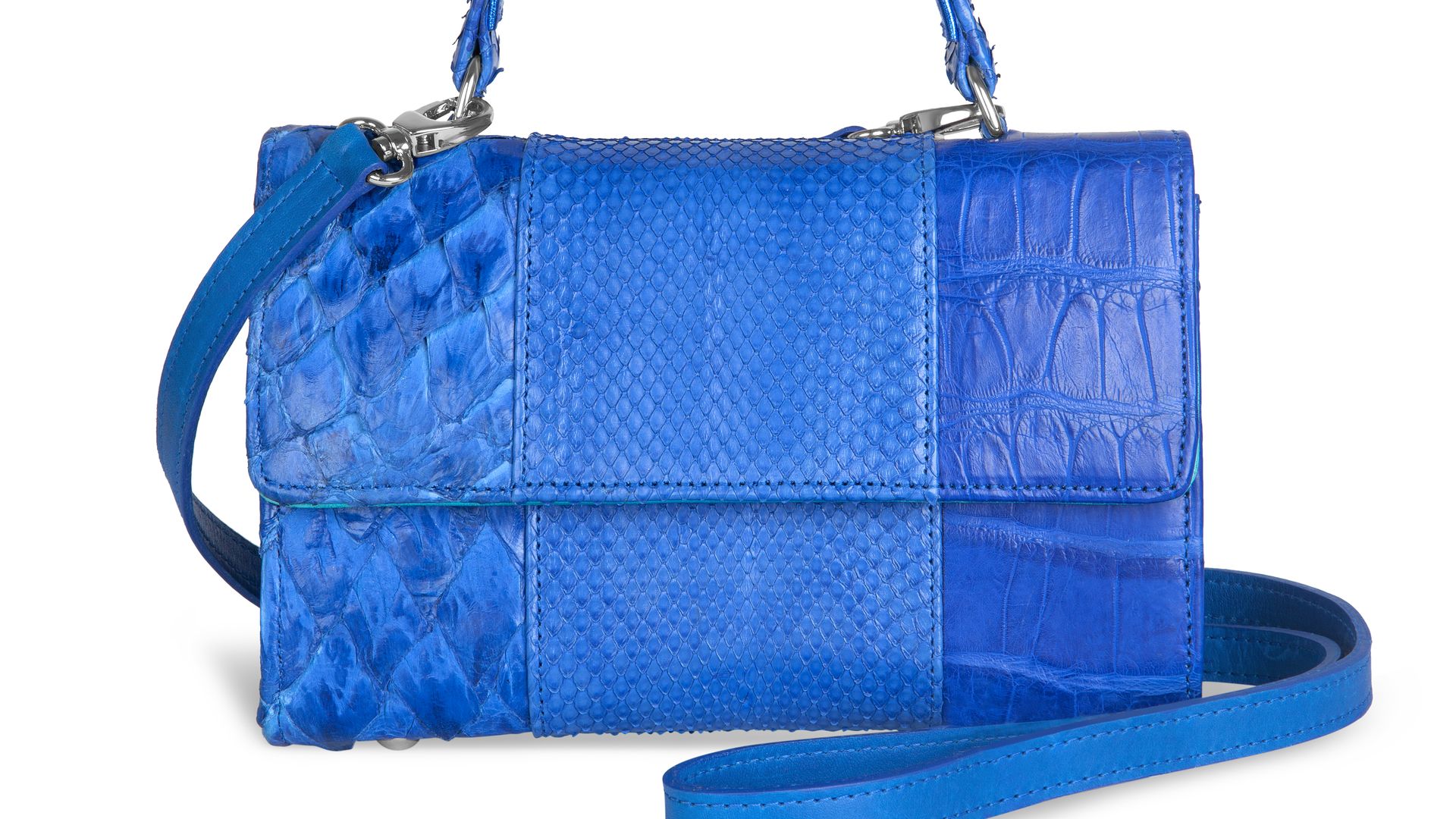 A bright royal blue purse with texture from animal skins 