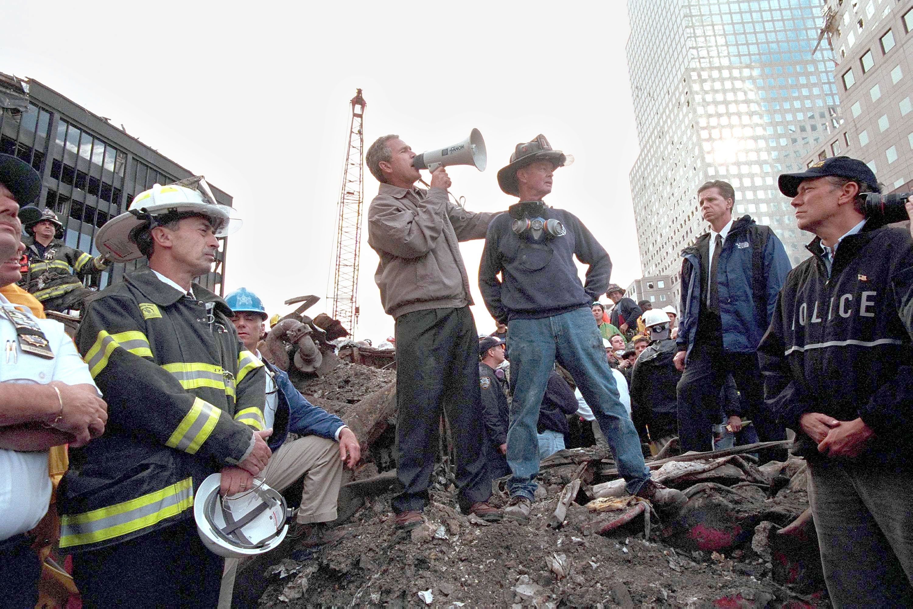 President George W. Bush stands with firefighter Bob Beckwith at Ground Zero on Sept. 14, 2001.