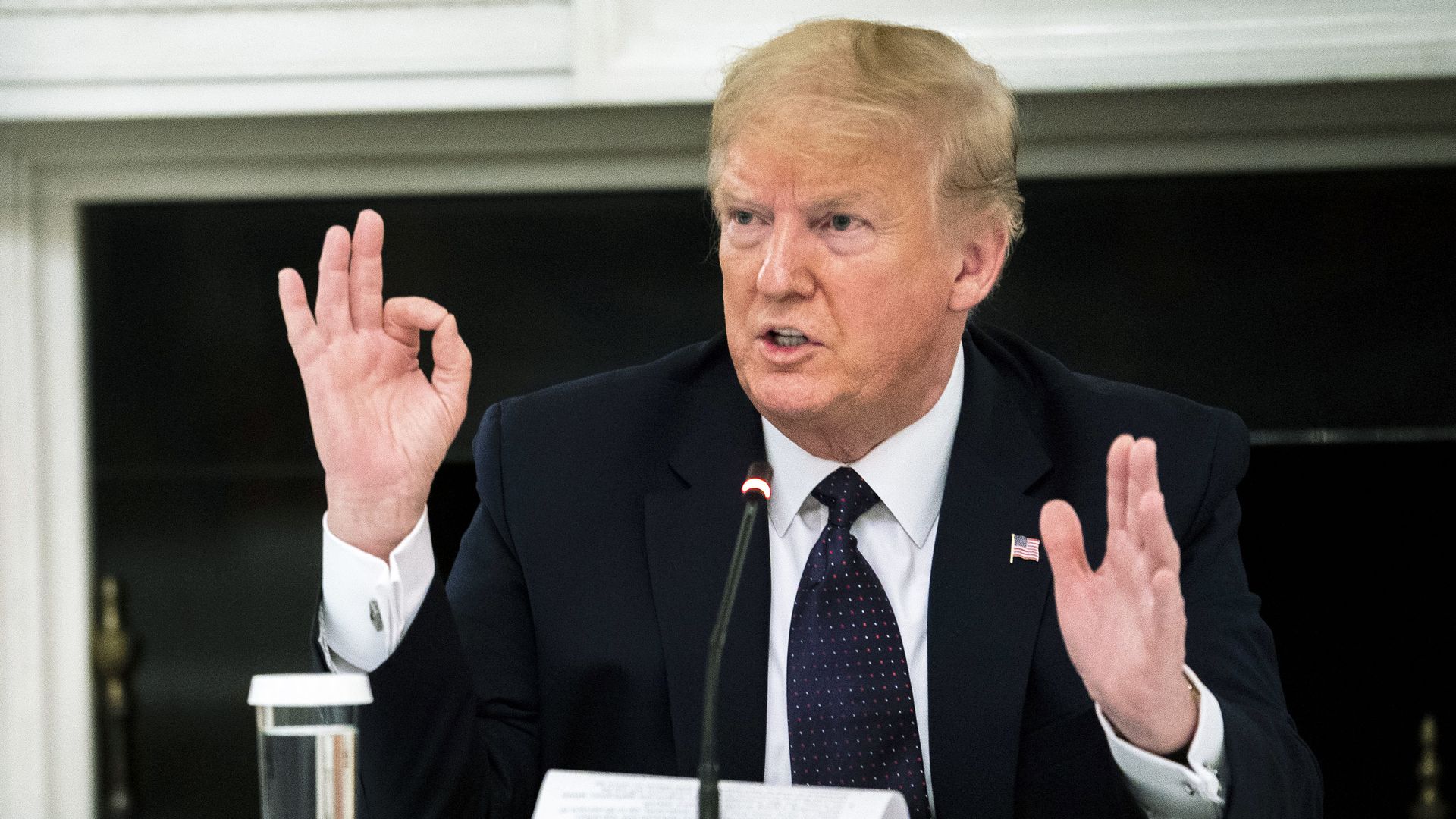 President Donald Trump speaks during a roundtable in the State Dining Room of the White House 