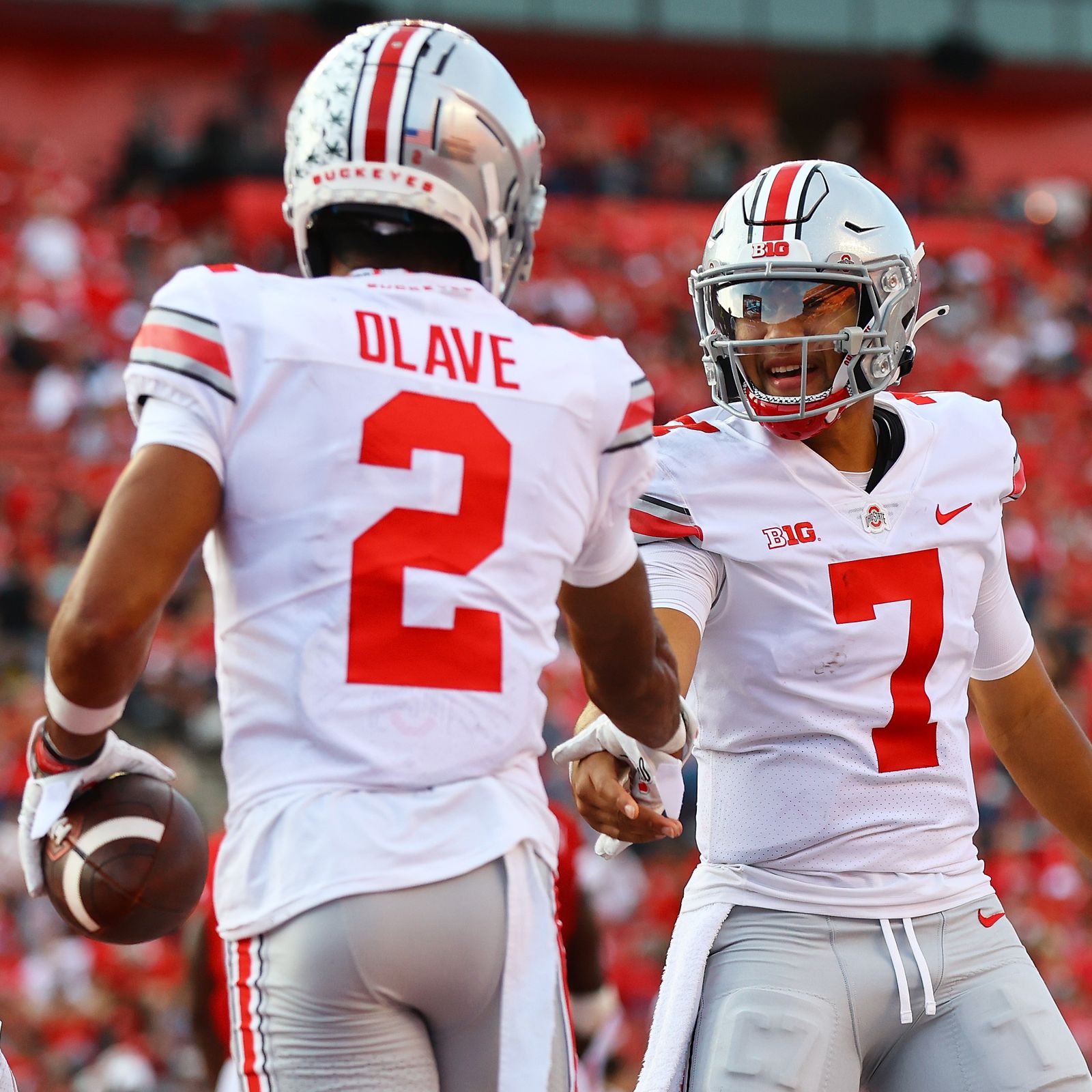 Chris Olave of the Ohio State Buckeyes celebrates after a touchdown