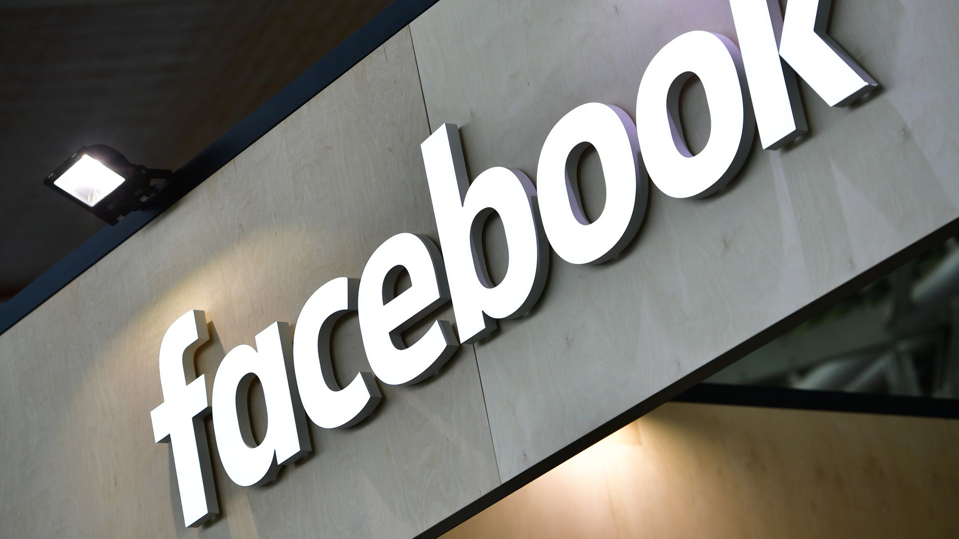 Facebook's logo on a sign