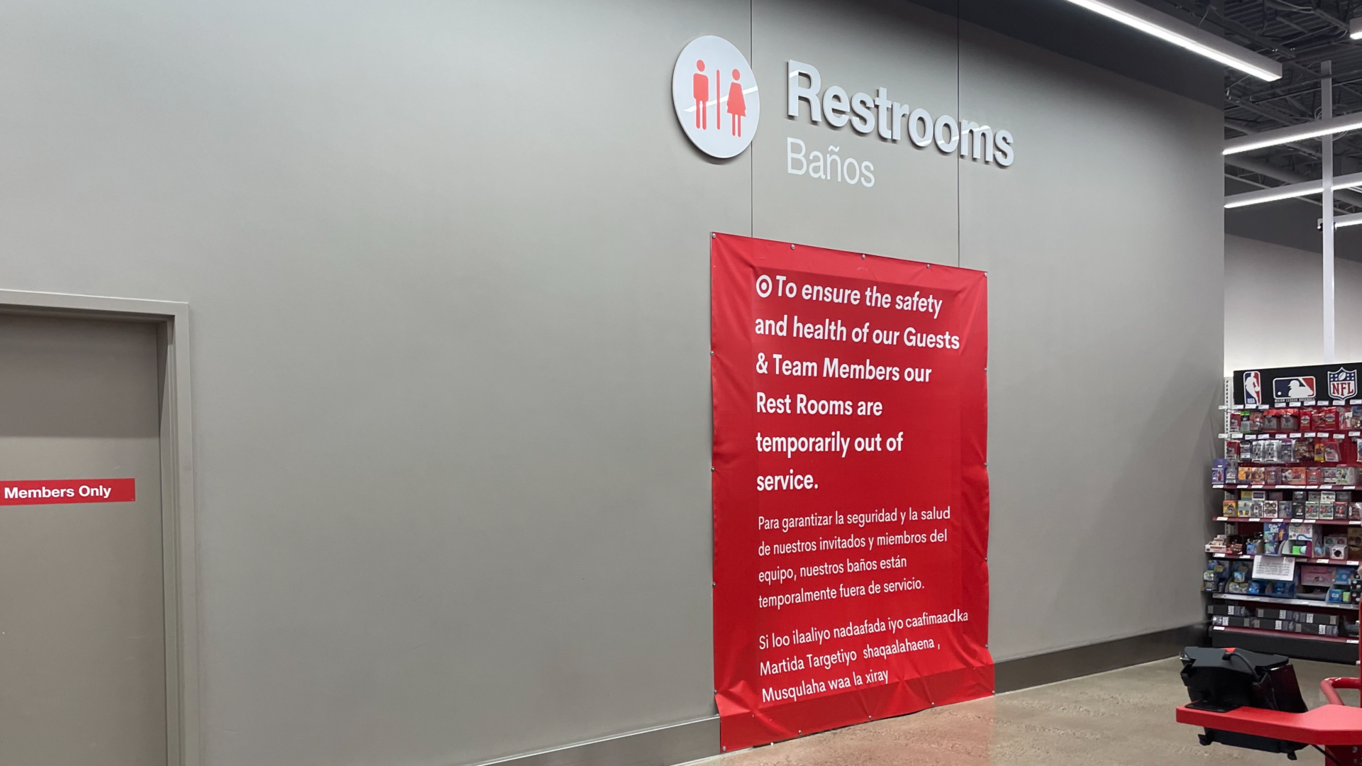 Sign covering target bathroom saying bathrooms are not open