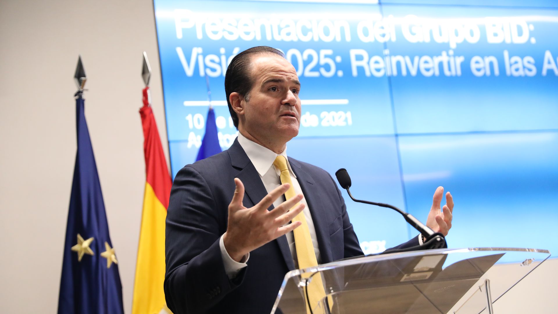 Photo of Mauricio Claver-Caron speaking from a podium at a summit