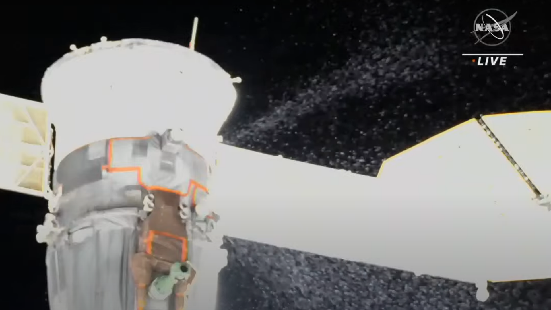 A stream of particles exiting from a Soyuz spacecraft docked to the International Space Station on Dec. 15.