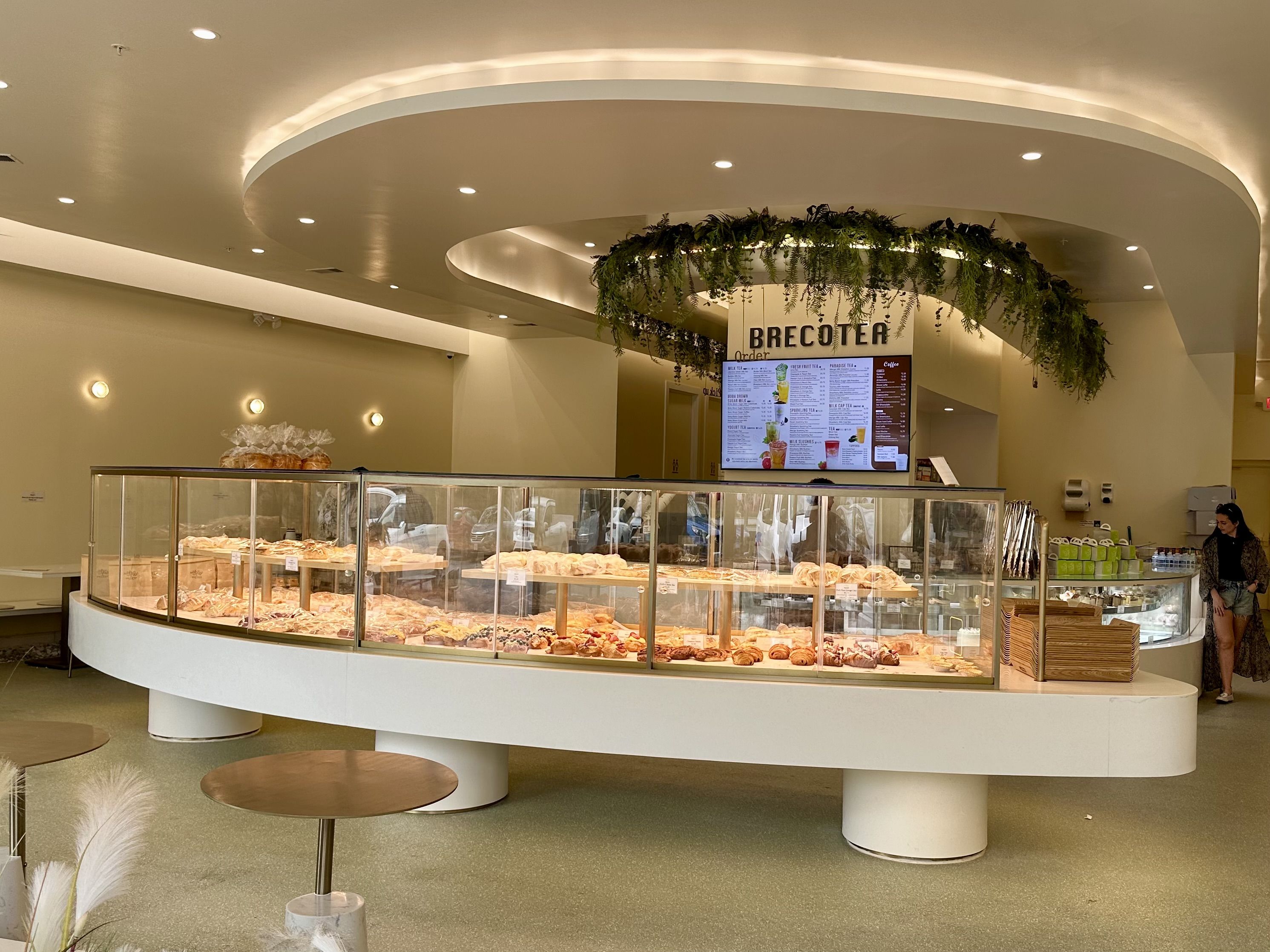 Help yourself to the bakery case — it opens on both sides. Photo: Karri Peifer/Axios 