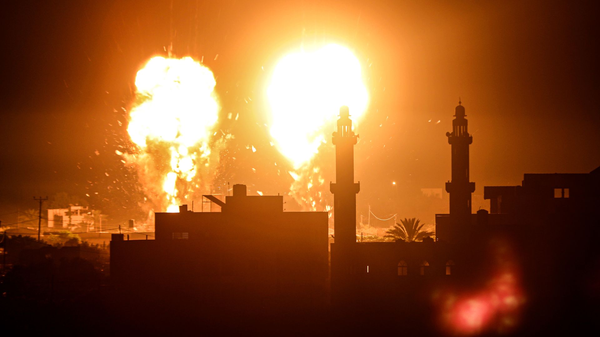  Flames are seen after an Israeli air strike hit Hamas targets in Gaza City, Gaza on June 15, 2021. (Photo by Ali Jadallah/Anadolu Agency via Getty Images)