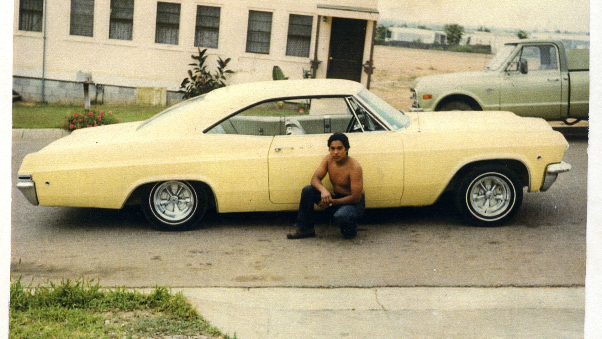 David Aguilar from the Chicano Brothers Car Club with a 1965 Chevrolet in 1980