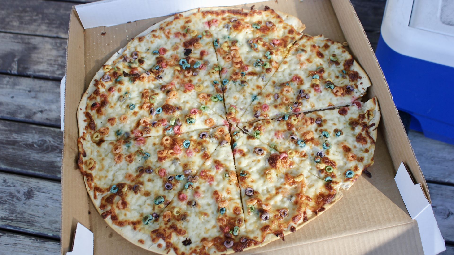 A pizza with Froot Loops topping.