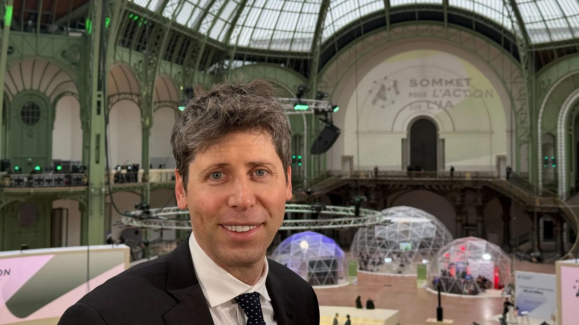 Photo of Sam Altman smiling at Paris event