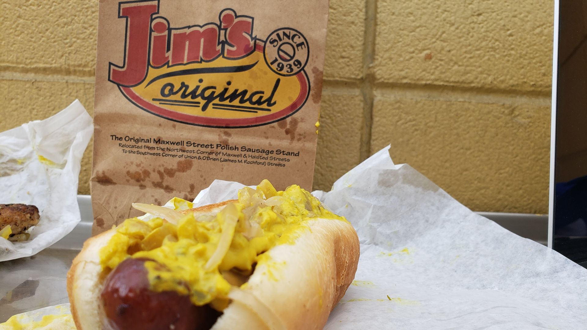 A photo of a deep-fried polish sausage sandwich. 