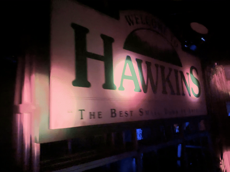 A gif of the inside of the Netflix House experience showing Hawkins from Stranger Things