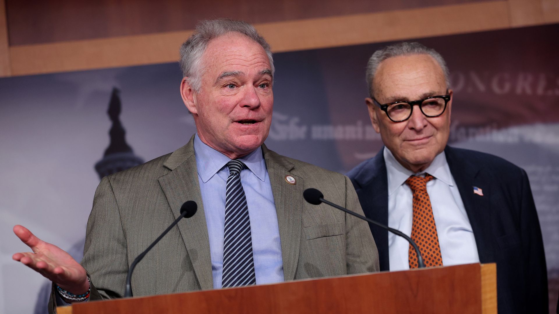 Sen. Tim Kaine and Senate Minority Leader Chuck Schumer speak at a news conference at the U.S. Capitol on Jan. 8.