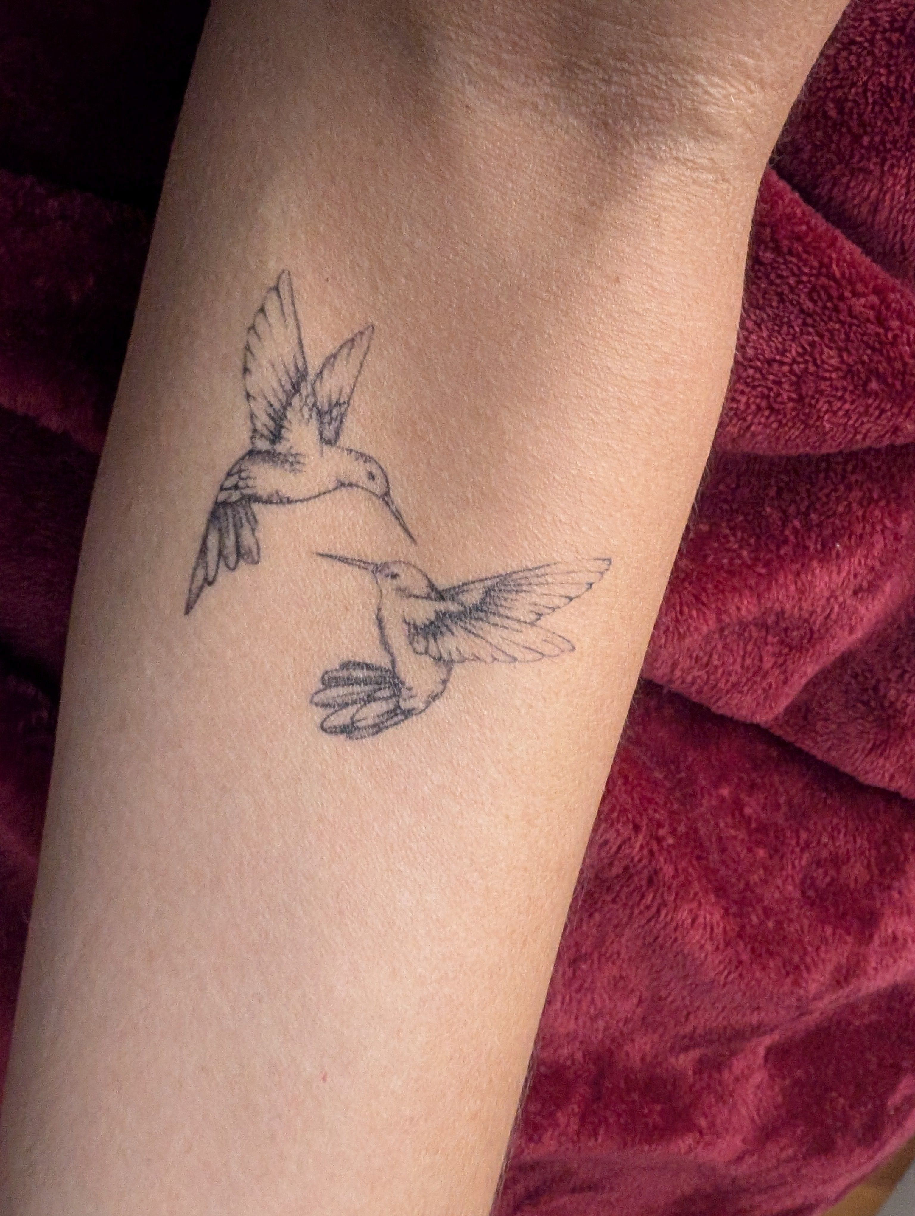 Tattoo of two birds