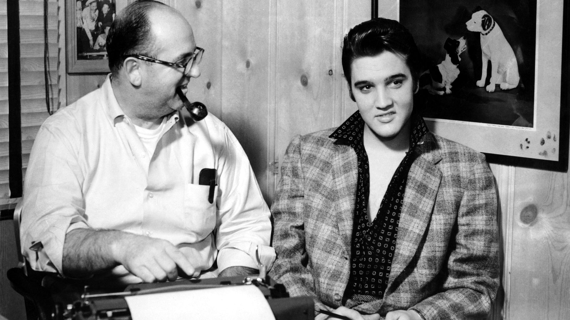 black and white photo of elvis and the colonel