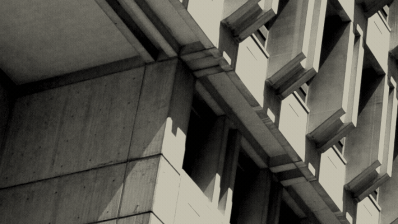 Animated illustration of the Boston City Hall facade with a blue and yellow checkmark drawing over it.