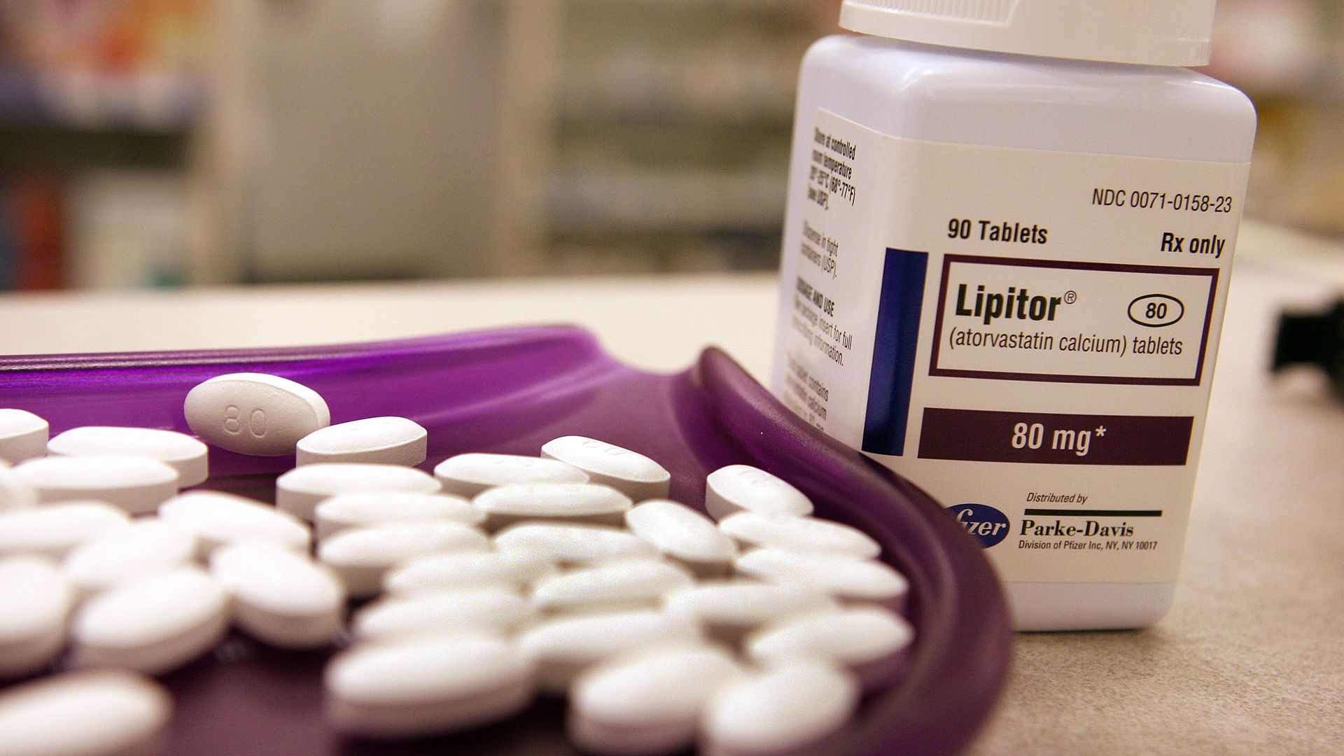 A Lipitor bottle and pills.