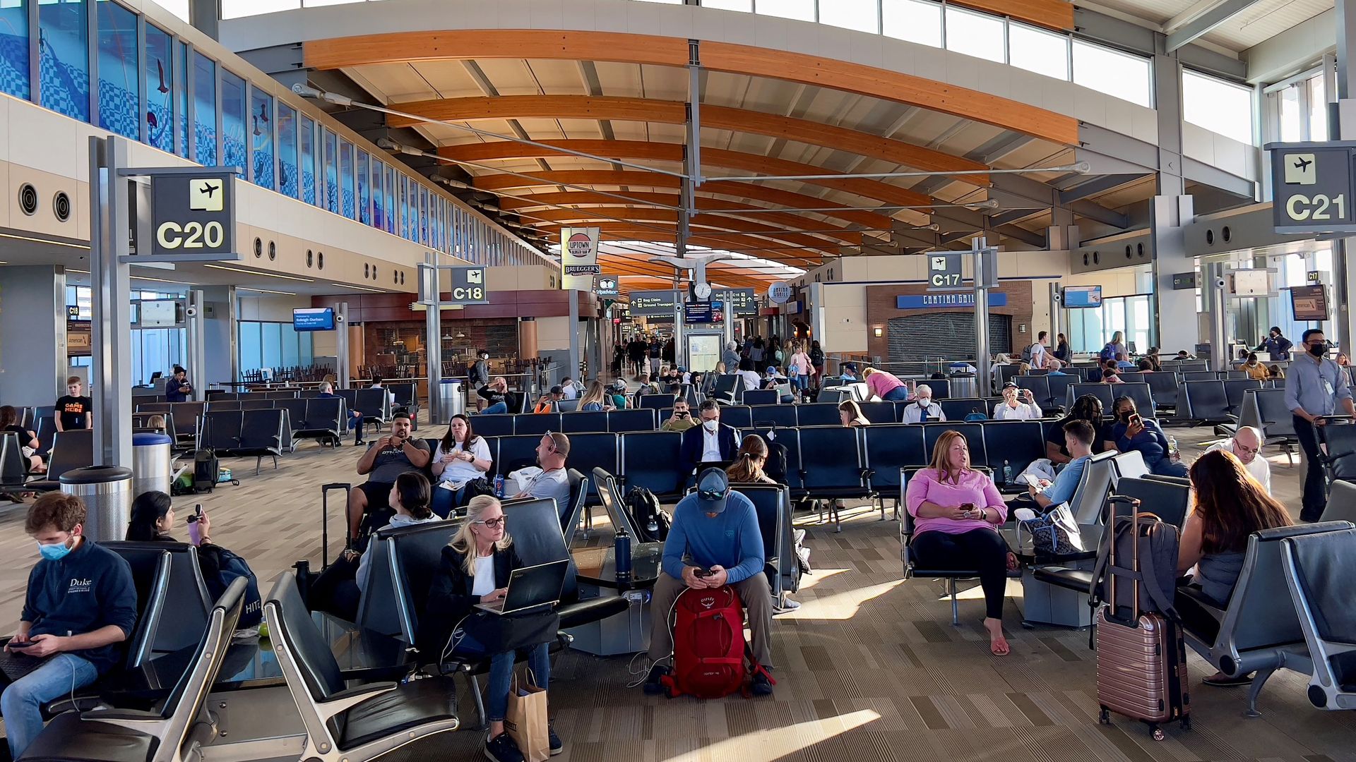 Passengers waiting at Raleigh-Durham International Airport.