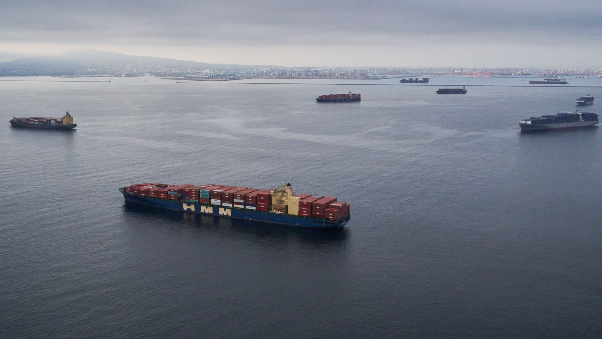 Picture of several container ships at sea