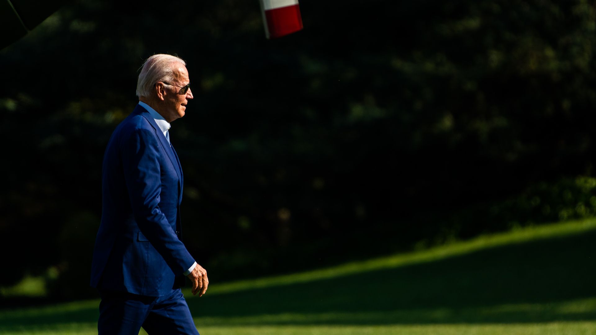 President Joe Biden walk to the Oval Office of the White House on July 20, 2022.
